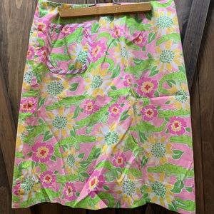 Lily Pulitzer pink with alligator pattern skirt